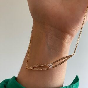 Swarovski necklace, it’s almost new but I threw away the box. Golden.